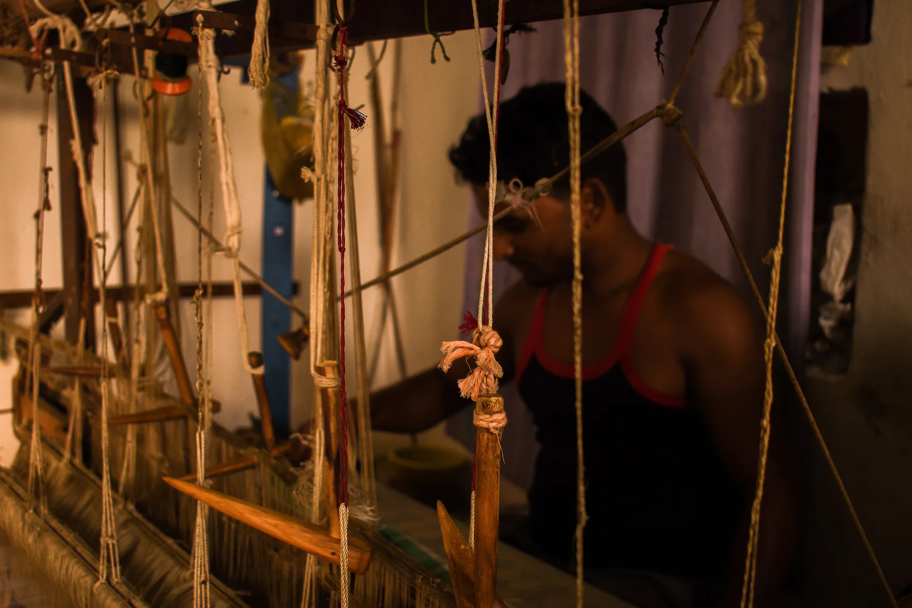 Silk weaver at a loom in Chanderi village